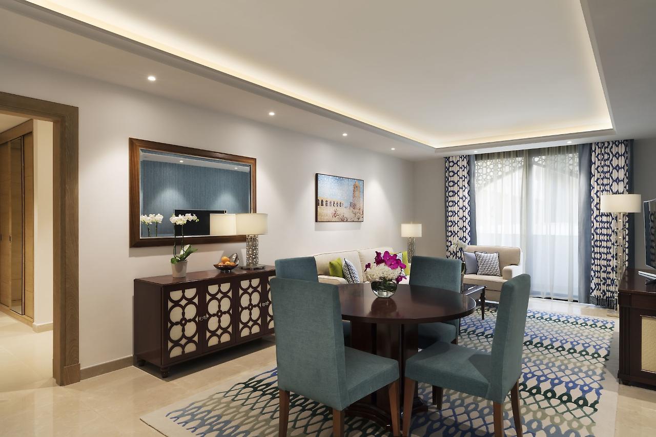 Al Najada Doha Hotel By Tivoli Exterior photo A dining room