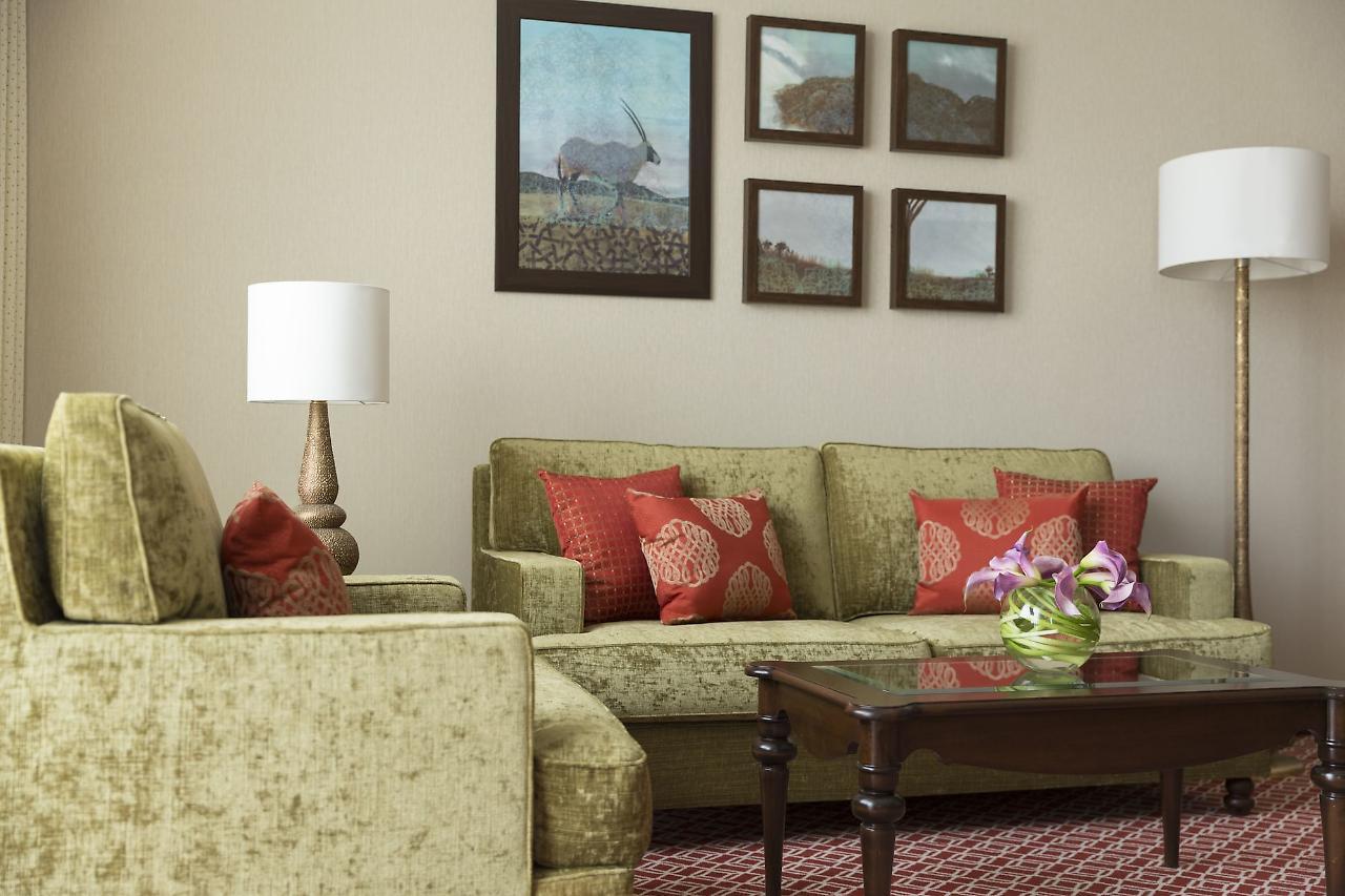 Al Najada Doha Hotel By Tivoli Exterior photo A living room