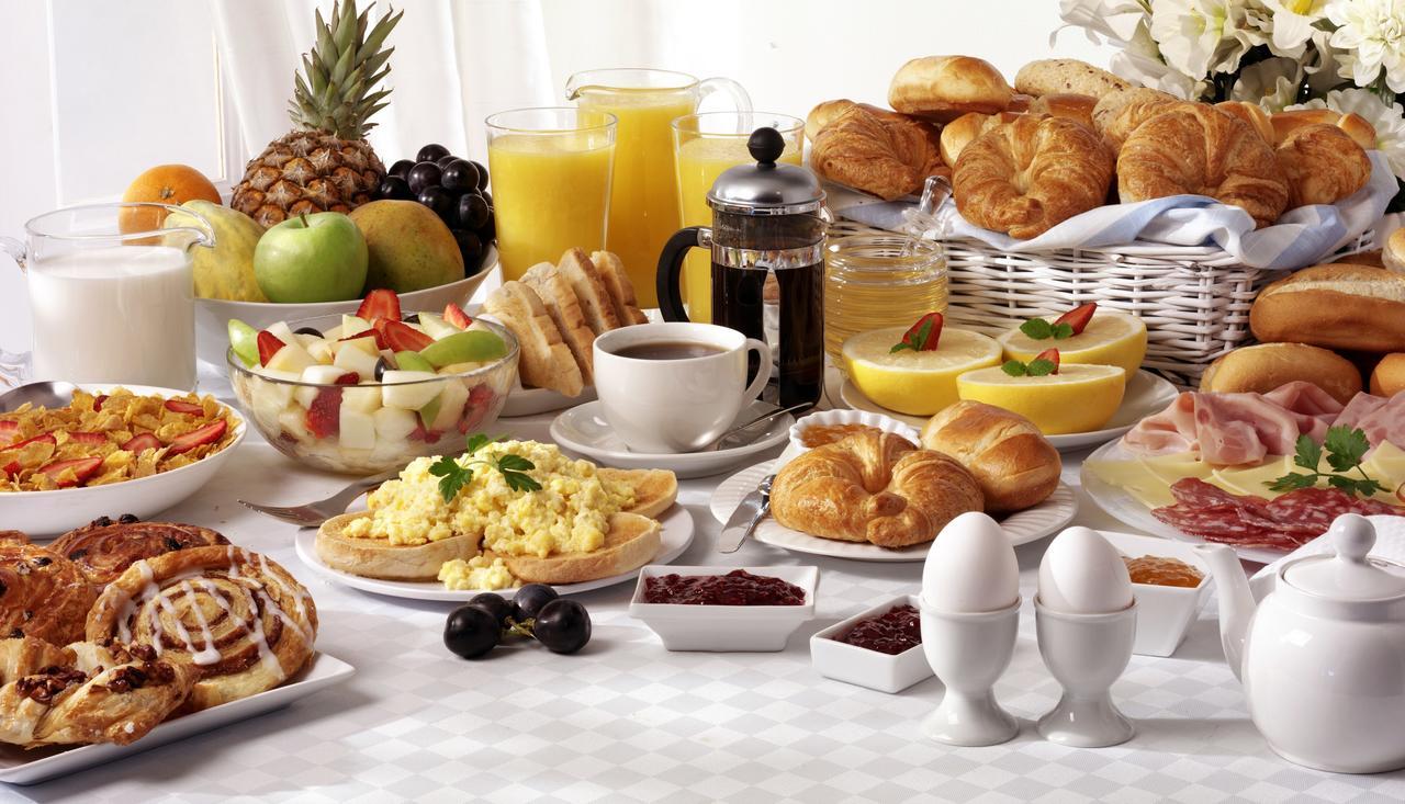 Al Najada Doha Hotel By Tivoli Exterior photo A breakfast buffet