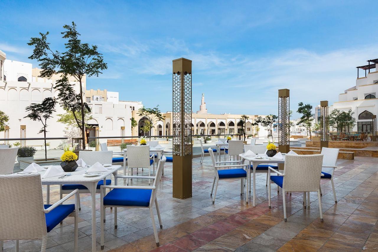 Al Najada Doha Hotel By Tivoli Exterior photo The hotel's rooftop